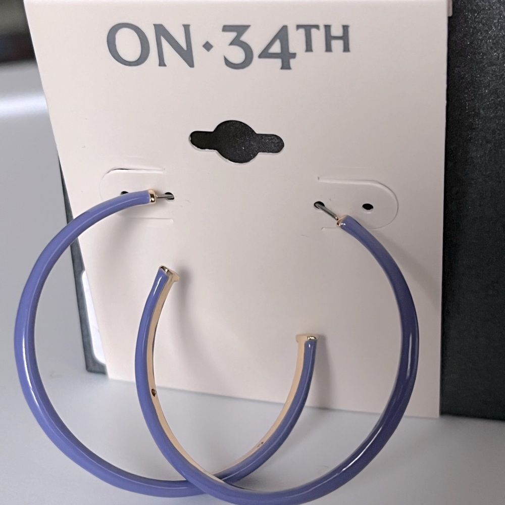 NEW on 34th purple hoop earrings